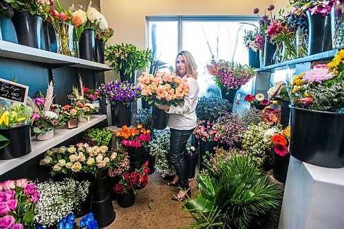 MIKAELA MACKENZIE / WINNIPEG FREE PRESS

Julie Myers, owner of Floral Fixx, poses for a portrait in the flower cooler at the shop in Winnipeg on Monday, Feb. 8, 2021. For Nicole story.

Winnipeg Free Press 2021