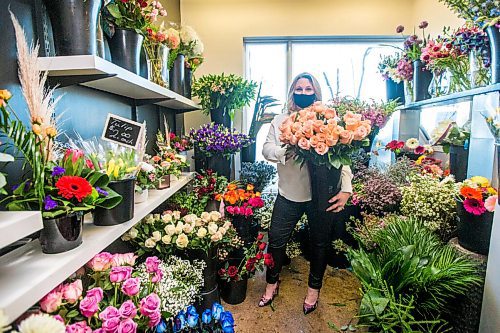 MIKAELA MACKENZIE / WINNIPEG FREE PRESS

Julie Myers, owner of Floral Fixx, poses for a portrait in the flower cooler at the shop in Winnipeg on Monday, Feb. 8, 2021. For Nicole story.

Winnipeg Free Press 2021