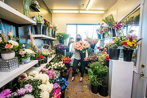 MIKAELA MACKENZIE / WINNIPEG FREE PRESS

Julie Myers, owner of Floral Fixx, poses for a portrait in the flower cooler at the shop in Winnipeg on Monday, Feb. 8, 2021. For Nicole story.

Winnipeg Free Press 2021