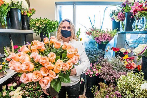 MIKAELA MACKENZIE / WINNIPEG FREE PRESS

Julie Myers, owner of Floral Fixx, poses for a portrait in the flower cooler at the shop in Winnipeg on Monday, Feb. 8, 2021. For Nicole story.

Winnipeg Free Press 2021