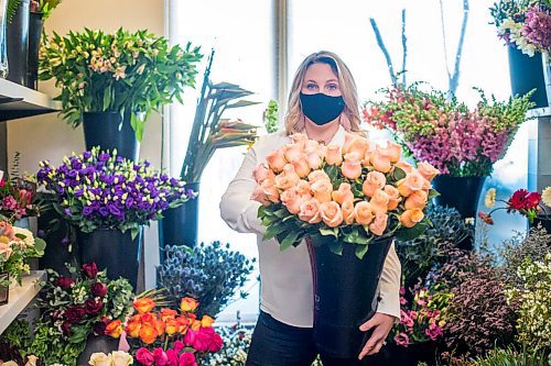 MIKAELA MACKENZIE / WINNIPEG FREE PRESS

Julie Myers, owner of Floral Fixx, poses for a portrait in the flower cooler at the shop in Winnipeg on Monday, Feb. 8, 2021. For Nicole story.

Winnipeg Free Press 2021