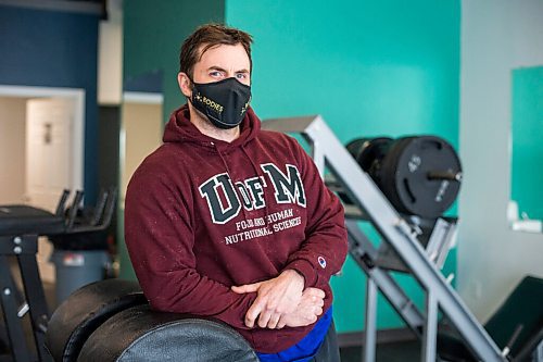 MIKAELA MACKENZIE / WINNIPEG FREE PRESS

Dino Camiré, owner of One Family Fitness, poses for a portrait in the gym in Winnipeg on Tuesday, Feb. 9, 2021. For Temur story.

Winnipeg Free Press 2021