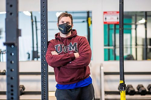 MIKAELA MACKENZIE / WINNIPEG FREE PRESS

Dino Camiré, owner of One Family Fitness, poses for a portrait in the gym in Winnipeg on Tuesday, Feb. 9, 2021. For Temur story.

Winnipeg Free Press 2021