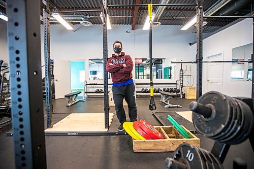 MIKAELA MACKENZIE / WINNIPEG FREE PRESS

Dino Camiré, owner of One Family Fitness, poses for a portrait in the gym in Winnipeg on Tuesday, Feb. 9, 2021. For Temur story.

Winnipeg Free Press 2021