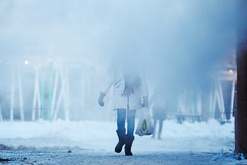 JOHN WOODS / WINNIPEG FREE PRESS
A person walks through a building vent in Winnipeg Tuesday, February 9, 2021. Winnipeg is experiencing seasonally cold temperatures.

Reporter: ?