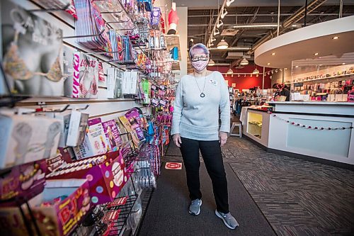 MIKAELA MACKENZIE / WINNIPEG FREE PRESS

Linda Zuzanski, president of Love Nest, poses for a portrait with games for couples at the shop in Winnipeg on Wednesday, Feb. 10, 2021. For Jen Zoratti story.

Winnipeg Free Press 2021