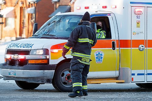 JOHN WOODS / WINNIPEG FREE PRESS
Firefighters and paramedics work a collision scene on Arlington at Bannatyne in Winnipeg Wednesday, February 10, 2021. 

Reporter: Thorpe