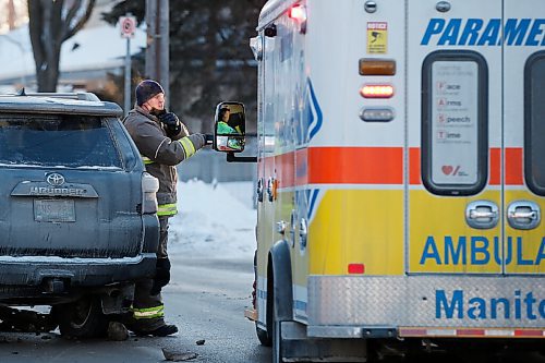 JOHN WOODS / WINNIPEG FREE PRESS
Firefighters and paramedics work a collision scene on Arlington at Bannatyne in Winnipeg Wednesday, February 10, 2021. 

Reporter: Thorpe