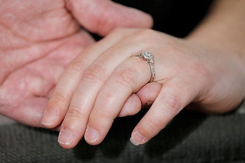 JOHN WOODS / WINNIPEG FREE PRESS
Jacquelynn Sharman and Dan Scheuerpflug, who had planned their wedding for Aug 22, 2020, but had to push it back to August 27, 2022, are photographed in their home in Winnipeg Wednesday, February 10, 2021. 

Reporter: Pindera