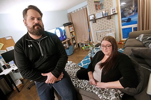 JOHN WOODS / WINNIPEG FREE PRESS
Jacquelynn Sharman and Dan Scheuerpflug, who had planned their wedding for Aug 22, 2020, but had to push it back to August 27, 2022, are photographed in their home in Winnipeg Wednesday, February 10, 2021. 

Reporter: Pindera