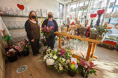 MIKE DEAL / WINNIPEG FREE PRESS
Deb Woloshyn (left), co-owner with her sister, Gloria Sawatzky (right), of Beyond Flowers (1099 Corydon Ave) says that orders were coming in last November for Valentine's day roses and that even the extra ones they ordered have already been sold. Valentine's Day is definitely not a day you want to buy roses at the last minute. 
See Temur Durrani story
210211 - Thursday, February 11, 2021.