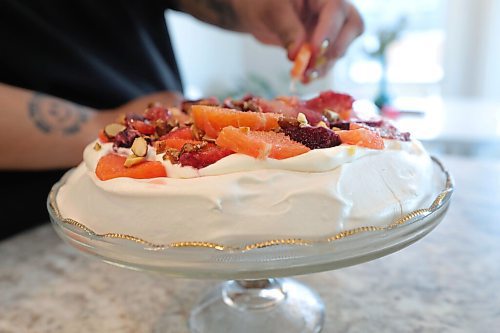 RUTH BONNEVILLE / WINNIPEG FREE PRESS 

ENT - home cooking

Photos of baker, Kenya Sookermany, with her Winter, Citrus Pavlova, a meringue base cake with cara cara and blood orange topping, that she made in her home kitchen. 

Subject: Kenya Sookermany is the subject of my next Homemade feature. She's a professional and home baker in Steinbach and has studied breadmaking in Germany. 


Eva Wasney story.


Feb 11, 2021
