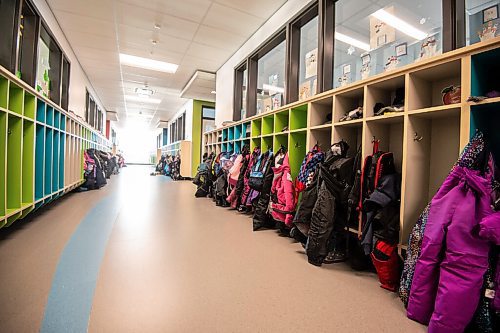 MIKE SUDOMA / WINNIPEG FREE PRESS
Childrens jackets line an empty hallway inside Templeton School Thursday
February 11, 2021