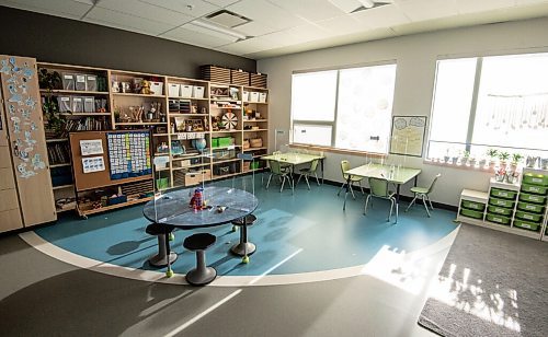 MIKE SUDOMA / WINNIPEG FREE PRESS
Plastic barriers dividing the childrens desks still allow for a collaborative seating arrangement while keeping students safe at Templeton School Thursday
February 11, 2021