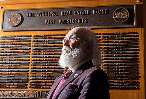 MIKE SUDOMA / WINNIPEG FREE PRESS
Newly elected Winnipeg Regional Real Estate Board President, Kourosh Doustshenas stands in front of the plaque of past board presidents at the Winnipeg Regional Real Estate Board offices Friday afternoon
February 11, 2021