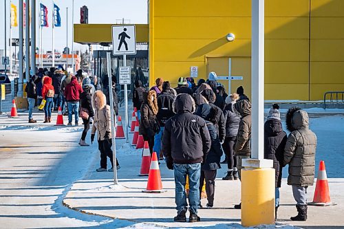 Daniel Crump / Winnipeg Free Press. People wait in line at IKEA while temperatures hover in the high minus twenties. February 13, 2021.