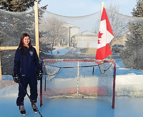 Canstar Community News Nicole Black, pictured here in the rink her father built her, will play hockey for the University of Calgary Dinos next season.