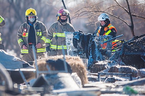 MIKAELA MACKENZIE / WINNIPEG FREE PRESS

Firefighters investigate a the scene of a fire at an encampment at 50 Higgins Avenue in Winnipeg on Tuesday, Feb. 16, 2021. For Katie story.

Winnipeg Free Press 2021