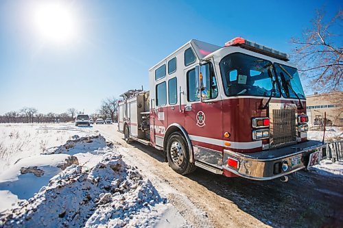 MIKAELA MACKENZIE / WINNIPEG FREE PRESS

Firefighters investigate a the scene of a fire at an encampment at 50 Higgins Avenue in Winnipeg on Tuesday, Feb. 16, 2021. For Katie story.

Winnipeg Free Press 2021