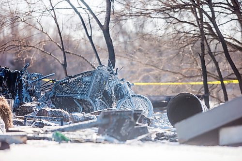 MIKAELA MACKENZIE / WINNIPEG FREE PRESS

Firefighters investigate a the scene of a fire at an encampment at 50 Higgins Avenue in Winnipeg on Tuesday, Feb. 16, 2021. For Katie story.

Winnipeg Free Press 2021