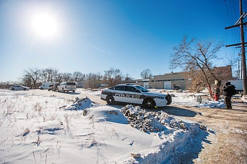 MIKAELA MACKENZIE / WINNIPEG FREE PRESS

Harrison Powder, anti-poverty advocate, watches as police investigate the scene of a fatal fire at an encampment at 50 Higgins Avenue in Winnipeg on Tuesday, Feb. 16, 2021. For Katie story.

Winnipeg Free Press 2021