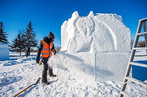 MIKAELA MACKENZIE / WINNIPEG FREE PRESS

Floriane Vermeire works on her first snow sculpture ever in front of Fort Gibraltar, which would usually be bustling with Festival du Voyageur events, in Winnipeg on Tuesday, Feb. 16, 2021. These sculptures are part of the Conseil jeunesse provincial Youth Symposium, meant to foster a new generation of sculptors and support students. Standup.

Winnipeg Free Press 2021