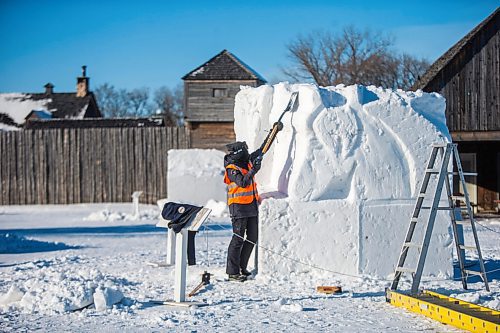 MIKAELA MACKENZIE / WINNIPEG FREE PRESS

Floriane Vermeire works on her first snow sculpture ever in front of Fort Gibraltar, which would usually be bustling with Festival du Voyageur events, in Winnipeg on Tuesday, Feb. 16, 2021. These sculptures are part of the Conseil jeunesse provincial Youth Symposium, meant to foster a new generation of sculptors and support students. Standup.

Winnipeg Free Press 2021