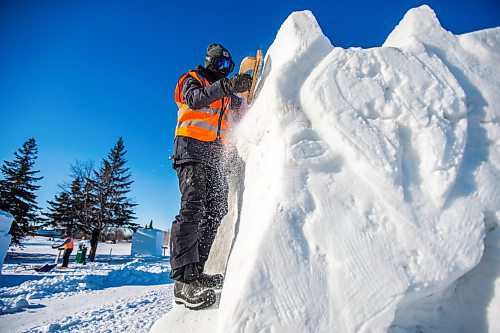 MIKAELA MACKENZIE / WINNIPEG FREE PRESS

Floriane Vermeire works on her first snow sculpture ever in front of Fort Gibraltar, which would usually be bustling with Festival du Voyageur events, in Winnipeg on Tuesday, Feb. 16, 2021. These sculptures are part of the Conseil jeunesse provincial Youth Symposium, meant to foster a new generation of sculptors and support students. Standup.

Winnipeg Free Press 2021