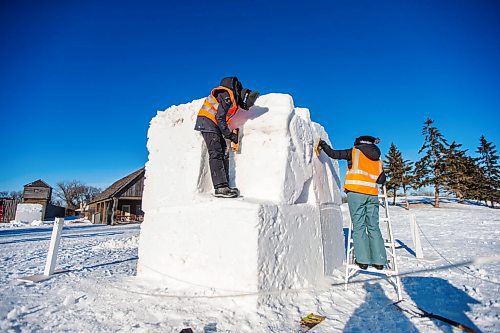 MIKAELA MACKENZIE / WINNIPEG FREE PRESS

Floriane Vermeire (left) and Jasmine Regnier work on their first snow sculpture ever in front of Fort Gibraltar, which would usually be bustling with Festival du Voyageur events, in Winnipeg on Tuesday, Feb. 16, 2021. These sculptures are part of the Conseil jeunesse provincial Youth Symposium, meant to foster a new generation of sculptors and support students. Standup.

Winnipeg Free Press 2021