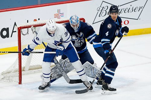 JOHN WOODS / WINNIPEG FREE PRESS
Toronto Marlies Kristians Rubins (40) shot from the point gets past Manitoba Moose goaltender Mikhail Berdin (40) as Johnathan Kovacevic (4) defends and Justin Brazeau (38) looks on during second period AHL action in Winnipeg on Sunday, February 16, 2021.

Reporter: McIntyre