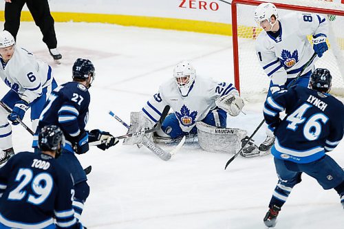 JOHN WOODS / WINNIPEG FREE PRESS
Manitoba Moose Tyler Graovac (27) takes the shot on Toronto Marlies goaltender Andrew D'Agostini (29) during second period AHL action in Winnipeg on Sunday, February 16, 2021.

Reporter: McIntyre