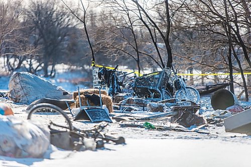 MIKAELA MACKENZIE / WINNIPEG FREE PRESS

One police car remains on the scene of a fatal fire at an encampment at 50 Higgins Avenue in Winnipeg on Wednesday, Feb. 17, 2021. For -- story.

Winnipeg Free Press 2021