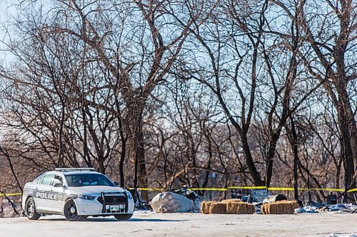 MIKAELA MACKENZIE / WINNIPEG FREE PRESS

One police car remains on the scene of a fatal fire at an encampment at 50 Higgins Avenue in Winnipeg on Wednesday, Feb. 17, 2021. For -- story.

Winnipeg Free Press 2021