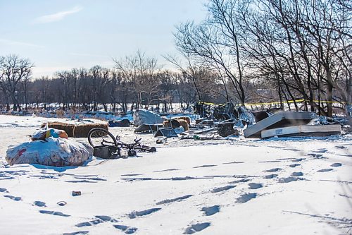 MIKAELA MACKENZIE / WINNIPEG FREE PRESS

One police car remains on the scene of a fatal fire at an encampment at 50 Higgins Avenue in Winnipeg on Wednesday, Feb. 17, 2021. For -- story.

Winnipeg Free Press 2021