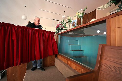 RUTH BONNEVILLE / WINNIPEG FREE PRESS 

49.8 - Pilgrim Baptist Church 

Photo of long-time PBC parishioner, Bill Thompson (husband to Valerie Williams), showing the baptismal tank which allows viewers to see into the tank from church pews. This unique feature is special to Thompson and the congregation.  

Description: Photos inside and outside the church and copied photos of exhibit of old photos on walls in the basement. 

Historical Info:  the Church which was the city's first Black church.

Reverend Dr. Joseph T. Hill was an American preacher who spent a great deal of time in Winnipeg during the 1920s and 1940s. He is also credited with founding the city's first Black church.

Pilgrim Baptist became a cornerstone of Black life in Manitoba. Aside from church services, it was a performing venue for local and visiting Black singers and celebrated American Thanksgiving annually for the large African-American contingent of the local Black community.
41 Maple St

 Reporter, JS, is looking at Winnipeg's longest-standing Black church.

Feb 17, 2021
