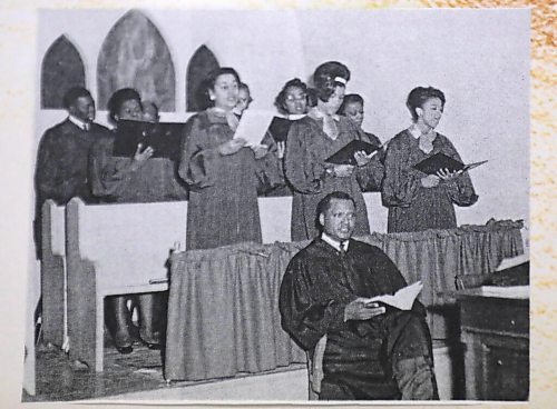 RUTH BONNEVILLE / WINNIPEG FREE PRESS 

49.8 - Pilgrim Baptist Church 

Church choir.

Description: Photos inside and outside the church and copied photos of exhibit of old photos on walls in the basement. 

Historical Info:  the Church which was the city's first Black church.

Reverend Dr. Joseph T. Hill was an American preacher who spent a great deal of time in Winnipeg during the 1920s and 1940s. He is also credited with founding the city's first Black church.

Pilgrim Baptist became a cornerstone of Black life in Manitoba. Aside from church services, it was a performing venue for local and visiting Black singers and celebrated American Thanksgiving annually for the large African-American contingent of the local Black community.
41 Maple St

 Reporter, JS, is looking at Winnipeg's longest-standing Black church.

Feb 17, 2021
