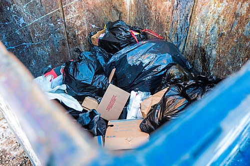 MIKAELA MACKENZIE / WINNIPEG FREE PRESS

Recycling mixed in with garbage at apartment building waste bins in Winnipeg on Wednesday, Feb. 17, 2021. For Sarah story.

Winnipeg Free Press 2021