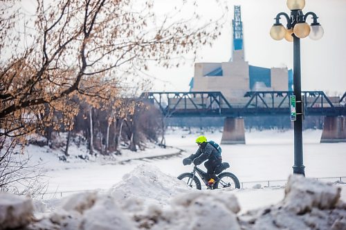 MIKAELA MACKENZIE / WINNIPEG FREE PRESS

A fatbiker takes advantage of the warmer winter weather at Fort Douglas Park in Winnipeg on Thursday, Feb. 18, 2021. Standup.

Winnipeg Free Press 2021