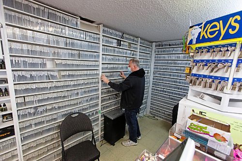 MIKE DEAL / WINNIPEG FREE PRESS
DVD rentals are still popular, with around 8,000 titles available. Oh, yah, you can get your keys cut too.
Ken Taylor's family-owned biz, around since the early '70s when it started as Ken's Kar Klinic (for his dad Ken Sr) - they added videos to the mix in 1983, closed the service station part of things three years later and though video rentals are no longer the lifeblood of the biz, you can still pick and choose from 1,000s of titles...  Ken saw sales of his VHS tapes go up, up, up in the early days last spring when people in the neighbourhood, many of whom don't have cable or Netflix, were running out of things to watch, so popped in to buy 10 tapes for 10 bucks - Ken figures if he can survive Blockbuster, he can survive COVID.
See Dave Sanderson Intersection story 
210218 - Thursday, February 18, 2021.