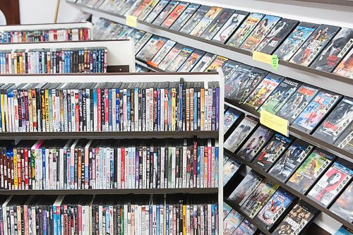 MIKE DEAL / WINNIPEG FREE PRESS
DVD rentals are still popular, with around 8,000 titles available. 
Ken Taylor's family-owned biz, around since the early '70s when it started as Ken's Kar Klinic (for his dad Ken Sr) - they added videos to the mix in 1983, closed the service station part of things three years later and though video rentals are no longer the lifeblood of the biz, you can still pick and choose from 1,000s of titles...  Ken saw sales of his VHS tapes go up, up, up in the early days last spring when people in the neighbourhood, many of whom don't have cable or Netflix, were running out of things to watch, so popped in to buy 10 tapes for 10 bucks - Ken figures if he can survive Blockbuster, he can survive COVID.
See Dave Sanderson Intersection story 
210218 - Thursday, February 18, 2021.