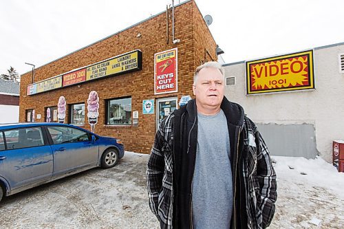 MIKE DEAL / WINNIPEG FREE PRESS
Ken Taylor's family-owned biz, around since the early '70s when it started as Ken's Kar Klinic (for his dad Ken Sr) - they added videos to the mix in 1983, closed the service station part of things three years later and though video rentals are no longer the lifeblood of the biz, you can still pick and choose from 1,000s of titles...  Ken saw sales of his VHS tapes go up, up, up in the early days last spring when people in the neighbourhood, many of whom don't have cable or Netflix, were running out of things to watch, so popped in to buy 10 tapes for 10 bucks - Ken figures if he can survive Blockbuster, he can survive COVID.
See Dave Sanderson Intersection story 
210218 - Thursday, February 18, 2021.