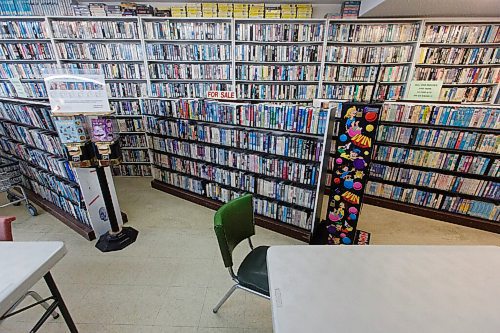 MIKE DEAL / WINNIPEG FREE PRESS
VHS movies are still available for purchase, though significantly less than the 30,000 titles the store rented in it's heyday.
Ken Taylor's family-owned biz, around since the early '70s when it started as Ken's Kar Klinic (for his dad Ken Sr) - they added videos to the mix in 1983, closed the service station part of things three years later and though video rentals are no longer the lifeblood of the biz, you can still pick and choose from 1,000s of titles...  Ken saw sales of his VHS tapes go up, up, up in the early days last spring when people in the neighbourhood, many of whom don't have cable or Netflix, were running out of things to watch, so popped in to buy 10 tapes for 10 bucks - Ken figures if he can survive Blockbuster, he can survive COVID.
See Dave Sanderson Intersection story 
210218 - Thursday, February 18, 2021.
