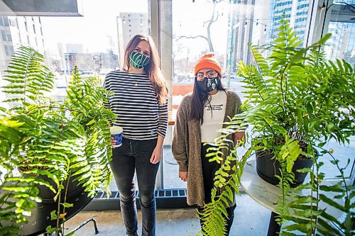 MIKAELA MACKENZIE / WINNIPEG FREE PRESS

Riel Lynch (left) and Jannica Reyes, who founded Winnipeg Free Plants, pose for a portrait with ferns at Fools & Horses in Winnipeg on Friday, Feb. 19, 2021. Jannica and Riel get donations of houseplants and distribute them to Winnipeggers in an effort to help them with their mental health. For Aaron Epp story.

Winnipeg Free Press 2021