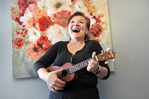 RUTH BONNEVILLE / WINNIPEG FREE PRESS 

ENT - ukulele

 Bev Watson, has just taken up the ukulele in January and has fallen in love with her new, creative outlet.

Bev can't hold back her beaming smile and exuberant joy as she's photographed in her home with her ukulele next to her favourite floral painting.

Description: 
Feature on the rise of people taking up ukuleles during the pandemic, and it's certainly the case in Winnipeg.

Story, by Alan Small, skedded for Tuesday, so we'll need photos for Monday.

Feb 19, 2021
