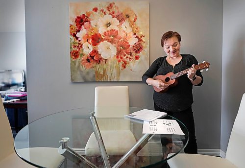 RUTH BONNEVILLE / WINNIPEG FREE PRESS 

ENT - ukulele

 Bev Watson, has just taken up the ukulele in January and has fallen in love with her new, creative outlet.

Bev can't hold back her beaming smile and exuberant joy as she's photographed in her home with her ukulele next to her favourite floral painting.

Description: 
Feature on the rise of people taking up ukuleles during the pandemic, and it's certainly the case in Winnipeg.

Story, by Alan Small, skedded for Tuesday, so we'll need photos for Monday.

Feb 19, 2021
