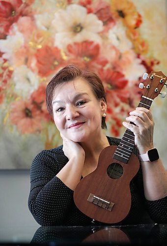 RUTH BONNEVILLE / WINNIPEG FREE PRESS 

ENT - ukulele

 Bev Watson, has just taken up the ukulele in January and has fallen in love with her new, creative outlet.

Bev can't hold back her beaming smile and exuberant joy as she's photographed in her home with her ukulele next to her favourite floral painting.

Description: 
Feature on the rise of people taking up ukuleles during the pandemic, and it's certainly the case in Winnipeg.

Story, by Alan Small, skedded for Tuesday, so we'll need photos for Monday.

Feb 19, 2021
