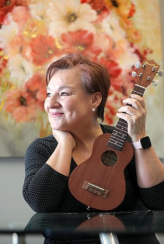 RUTH BONNEVILLE / WINNIPEG FREE PRESS
ENT - ukulele
Bev Watson, has just taken up the ukulele in January and has fallen in love with her new, creative outlet.
Bev can't hold back her beaming smile and exuberant joy as she's photographed in her home with her ukulele next to her favourite floral painting.
Description:
Feature on the rise of people taking up ukuleles during the pandemic, and it's certainly the case in Winnipeg.
Story, by Alan Small, skedded for Tuesday, so we'll need photos for Monday.
Feb 19, 2021