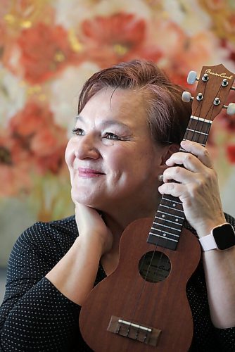 RUTH BONNEVILLE / WINNIPEG FREE PRESS 

ENT - ukulele

 Bev Watson, has just taken up the ukulele in January and has fallen in love with her new, creative outlet.

Bev can't hold back her beaming smile and exuberant joy as she's photographed in her home with her ukulele next to her favourite floral painting.

Description: 
Feature on the rise of people taking up ukuleles during the pandemic, and it's certainly the case in Winnipeg.

Story, by Alan Small, skedded for Tuesday, so we'll need photos for Monday.

Feb 19, 2021
