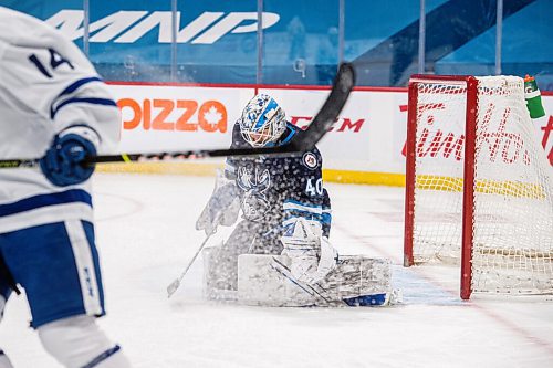 MIKE SUDOMA / WINNIPEG FREE PRESS 
Moose goalie, Mikhail Berdin, makes a first period pad save  as the Manitoba Moose take on the Toronto Marlies at Bell MTS Place Friday night
FEBRUARY 19, 2021