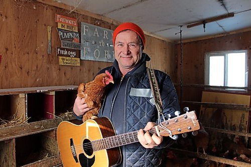 Canstar Community News Russell Loewen records a song in his hen house daily to send to his grandkids. Recently, he's been uploading them to YouTube. He's pictured in his hen house on Feb. 17. (GABRIELLE PICHÉ/CANSTAR COMMUNITY NEWS/HEADLINER)